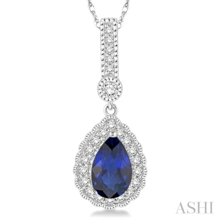 7x5 MM Pear Shape Sapphire and 1/5 Ctw Round Cut Diamond Pendant in 14K White Gold with Chain