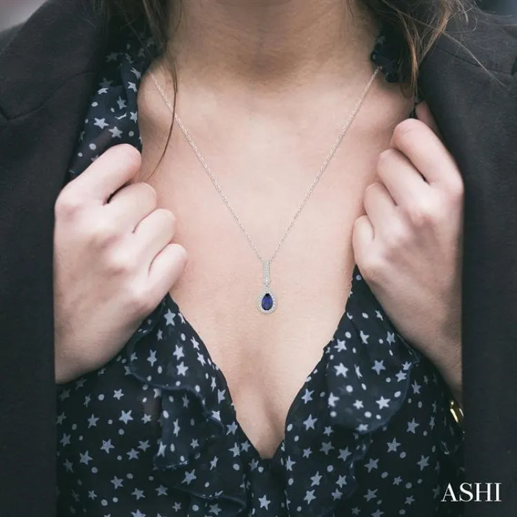 7x5 MM Pear Shape Sapphire and 1/5 Ctw Round Cut Diamond Pendant in 14K White Gold with Chain