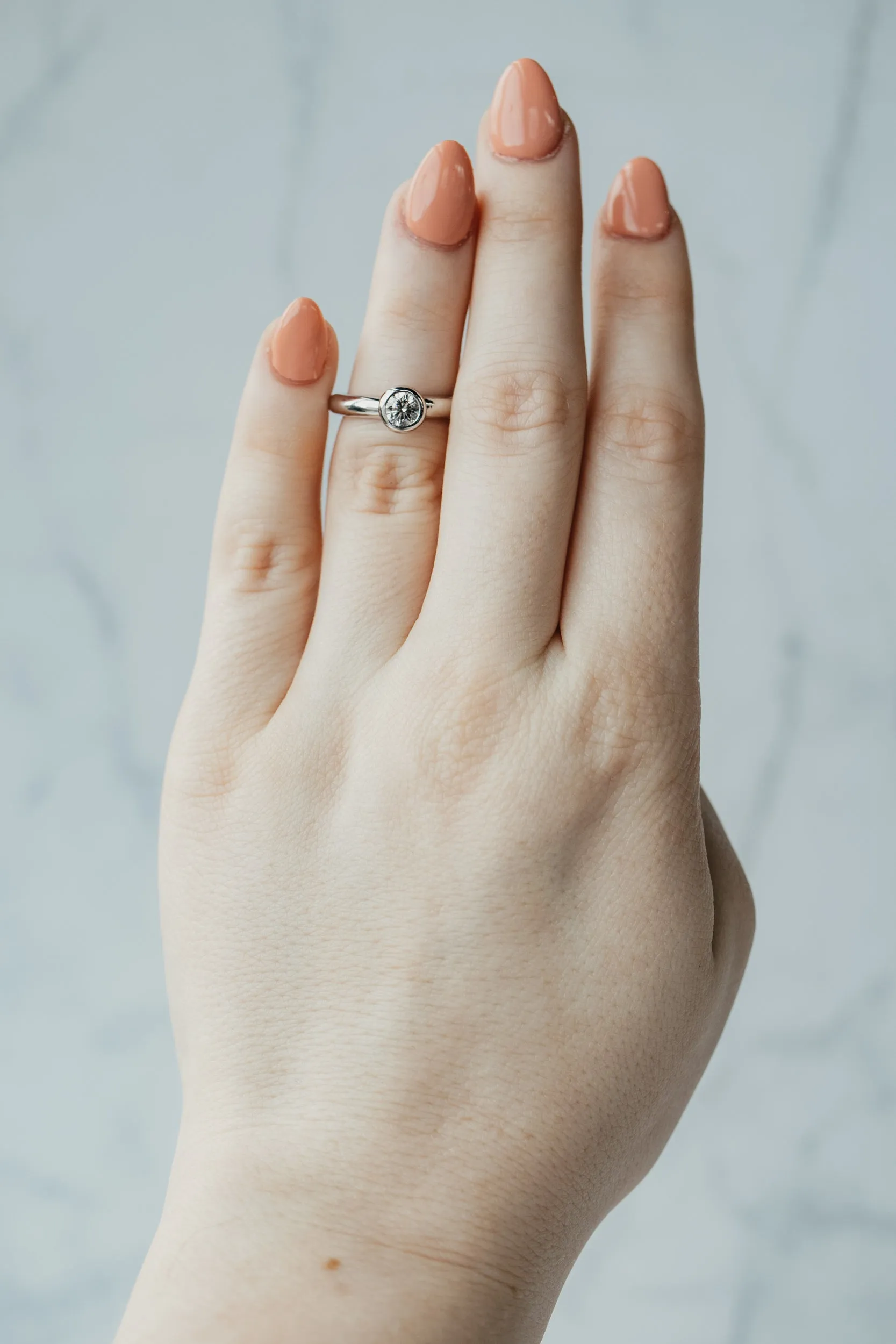 Bezel Set Round Brilliant Diamond Platinum Solitaire Ring
