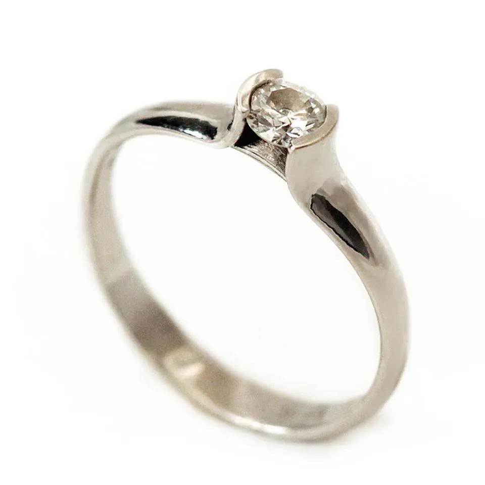 Diamond, white gold solitaire engagement ring