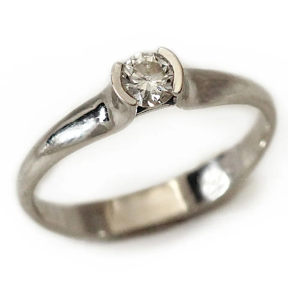 Diamond, white gold solitaire engagement ring