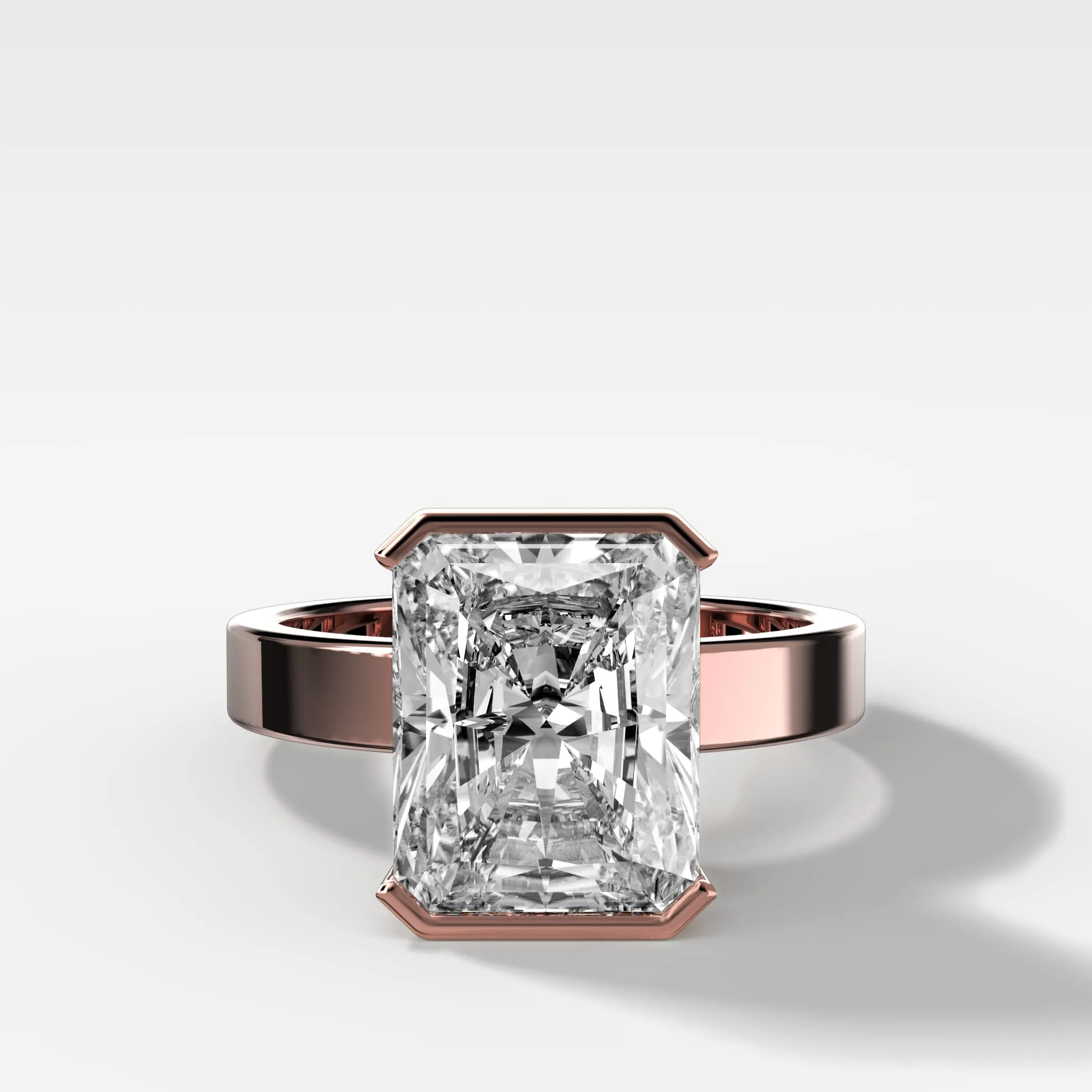 Finest Half Bezel Solitaire Engagement Ring With Elongated Radiant Cut Diamond