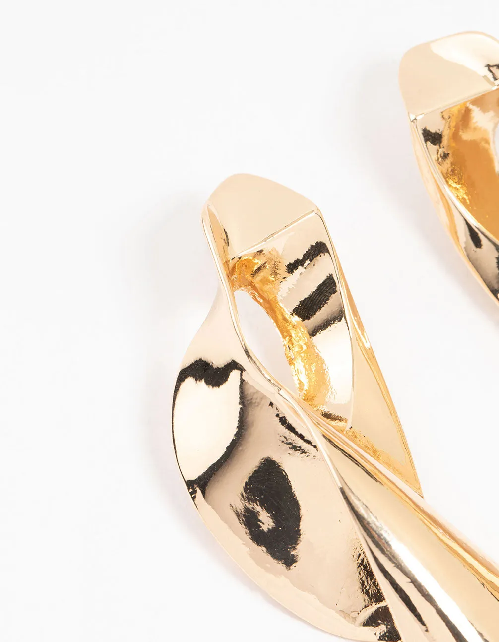 Gold Futuristic Twist Drop Earrings